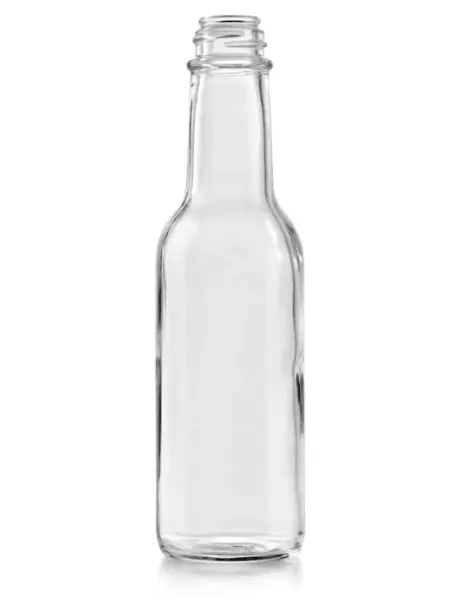 Empty glass opened bottle