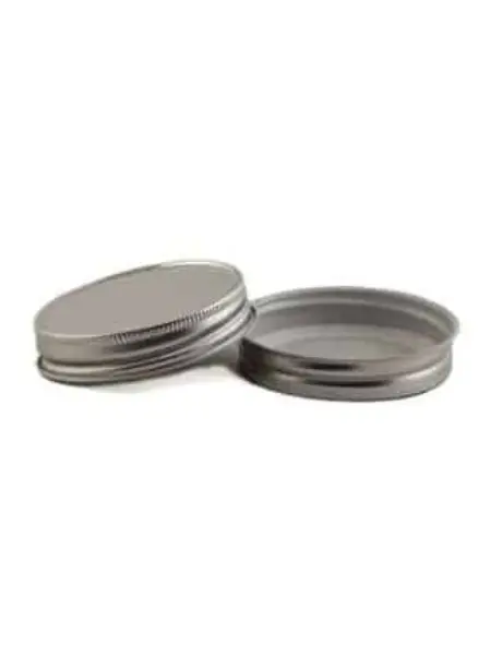 A pair of metal lids for canning jars.